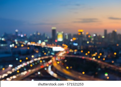 Abstract Blurred Bokeh Lights City And Road Intersection Aerial View