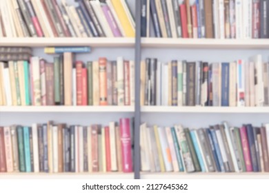 Abstract Blurred Books, Manuals And Textbooks On Bookshelves In Library, Book Store, At Home, For Light Modern Backdrop. Concept Of Learning, School, Back To School, Education