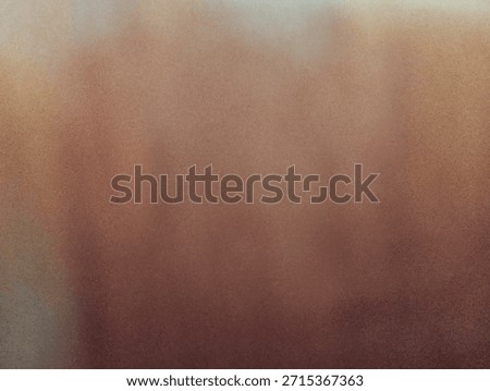 Abstract blurred brown gradient texture background with soft noise, warm tones, and minimal aesthetic suitable for design, branding, wallpaper, and creative projects.