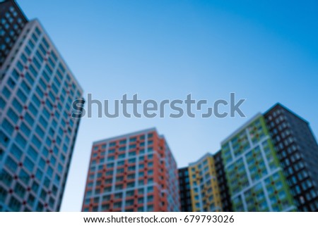 Abstract blurred buildings from below by looking up.