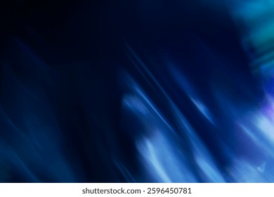 Abstract blurred colorful lens flare bokeh on black