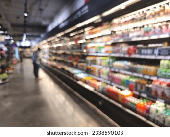 Abstract blurred Consumer select product or goods in the supermarket or convenience store.