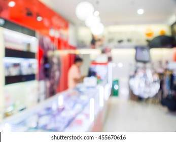 Abstract Blurred Counter Electronic Shop In The Mall Department Store.