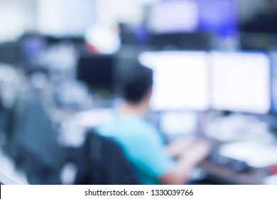 Abstract Blurred Data Network Employee Man Monitoring Alarm Alert On Computer At Operation Room Center For Protect And Detect Information Data In Cyber Concept