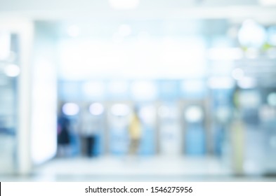 Abstract Blurred And Defocused Of ATM Machine For Withdraw Or Deposit Cash Money At Bank Office Background