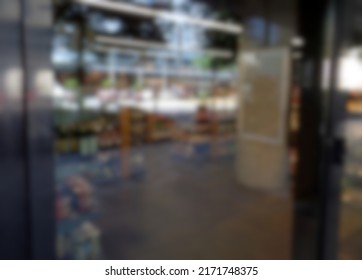 Abstract Blurred And Defocused Storefront Window Of The Supermarket And Retail Store Background