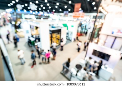Abstract blurred defocused trade event exhibition background, business convention show concept. Top view. - Shutterstock ID 1083078611