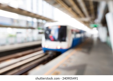 Abstract blurred electrical sky train at station - Shutterstock ID 240905491