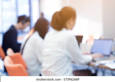 Abstract Blurred Employee Work In Office Room