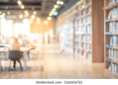 Abstract Blurred Empty College Library Interior Space. Blurry Classroom With Bookshelves By Defocused Effect. Use For Background Or Backdrop In Book Shop Business Or Education Resources Concepts