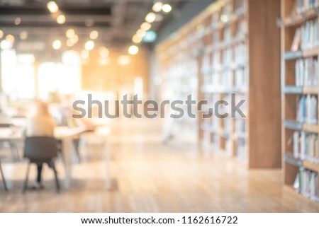 Abstract blurred empty college library interior space. Blurry classroom with bookshelves by defocused effect. use for background or backdrop in book shop business or education resources concepts