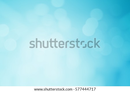 abstract blurred flash aura of blue background with bokeh flare light.
