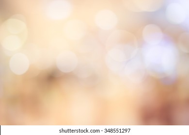abstract blurred golden color background in light warm tone.