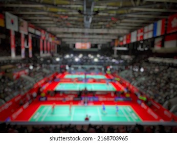 Abstract Blurred Of Green Badminton Court With Spotlight