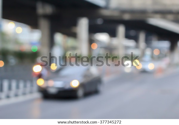 abstract blurred group of vehicles on road
street background