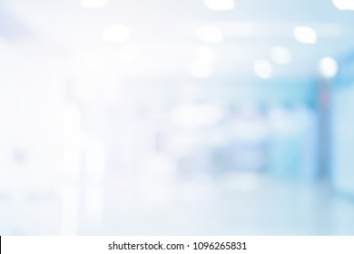 Abstract Blurred Of Hospital Corridor Blue Color Background Concept.