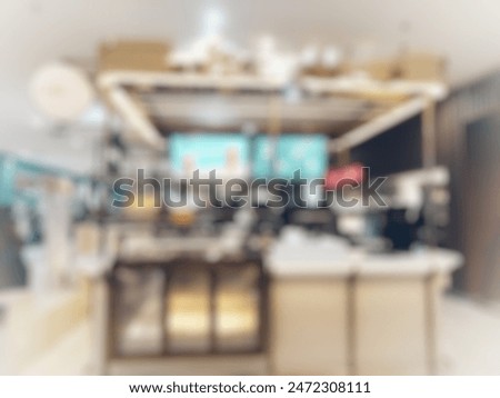 Abstract blurred image, Cafe stall inside modern shopping mall or shopping center 
