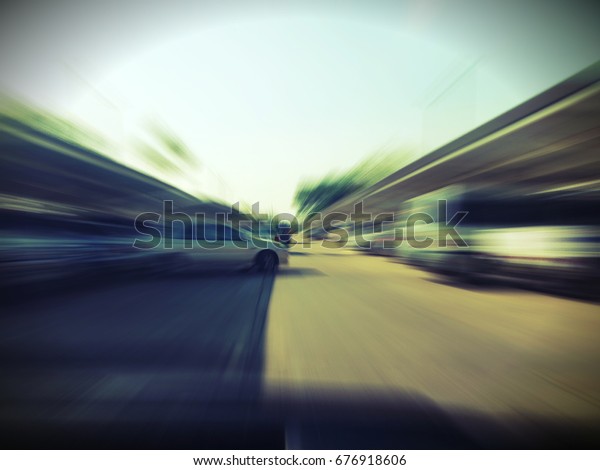 Abstract blurred image of Car parking in car park\
on daytime
