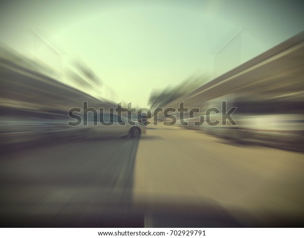 Abstract blurred image of Car parking in car park\
on daytime