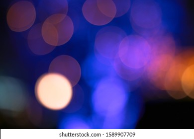 Abstract Blurred Image Of Carnival Amusement Part Background.