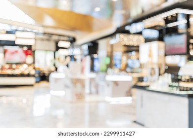 Abstract blurred image of cosmetics department store in the mall