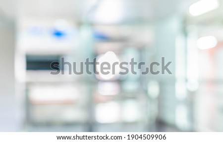 Abstract blurred image of  hallway with bokeh for background usage .