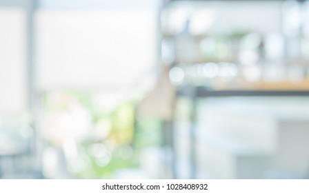 Abstract Blurred Image Of Outdoor Restaurant Or Cafe With Green Bokeh For Background Usage.