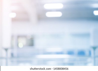 Abstract Blurred Inside Interior Hospital Corridor Blue Color Background With Light Concept.