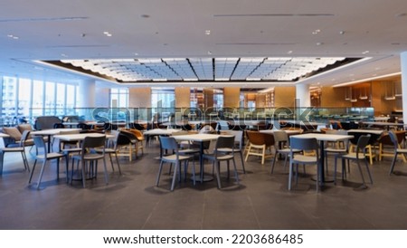 Abstract Blurred of Inside view, Food court in modern department store, Bright and fashionable interior of food court center and shop cafe in modern shopping mall.