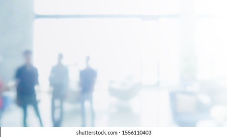 Abstract blurred interior modern office space with business people working banner background with copy space. - Shutterstock ID 1556110403