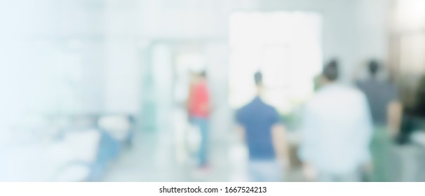 Abstract Blurred Interior Modern Office Space With Business People Working Banner Background With Copy Space.