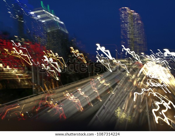 Abstract blurred light art scene\
of super highway in Brisbane Queensland Australia in the\
evening