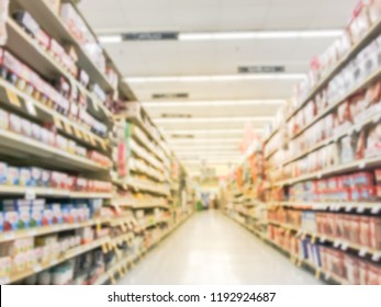 Abstract Blurred Low Angle View Bake Time, Spices, Cake Mixes, Cooking Oil, Gelatin, Cooking Gadgets, Food Storage Aisle At Grocery Store In Irving, Texas, US. Supermarket Shelves Variety Of Products