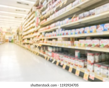 Abstract Blurred Low Angle View Bake Time, Spices, Cake Mixes, Cooking Oil, Gelatin, Cooking Gadgets, Food Storage Aisle At Grocery Store In Irving, Texas, US. Supermarket Shelves Variety Of Products