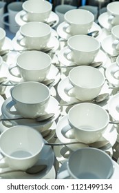 Abstract Blurred Many Rows Of Coffee Tea Cups With Coffee Dispenser