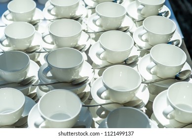 Abstract Blurred Many Rows Of Coffee Tea Cups With Coffee Dispenser