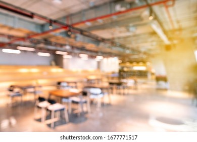 Abstract Blurred Modern Office Town Hall Interior And Meeting Space. Blurry Open Ceiling In Working Space With Defocused Effect. Use For Background Or Backdrop In Business Concept.