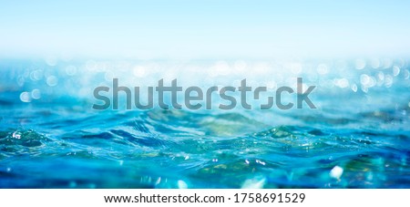 Abstract And Blurred Ocean With Defocused Lights
