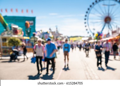 Abstract Blurred Oktoberfest Activity With People In  Munich City, Germany