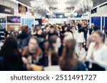 Abstract blurred people at exhibition hall of expo event trade show. Business convention show or job fair. Business concept background.