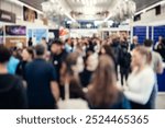 Abstract blurred people at exhibition hall of expo event trade show. Business convention show or job fair. Business concept background.