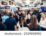 Abstract blurred people at exhibition hall of expo event trade show. Business convention show or job fair. Business concept background.