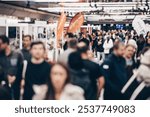 Abstract blurred people at exhibition hall of expo event trade show. Business convention show or job fair. Business concept background