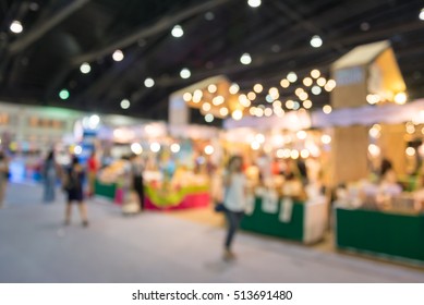 Abstract Blurred People In Food Festival For Background Usage