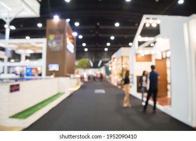 Abstract Blurred People In Home Design And Construction Fair Expo Background. International Exhibition Business Concept.