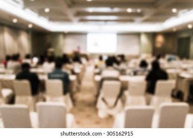 Abstract of blurred people in the meeting room - Shutterstock ID 305162915