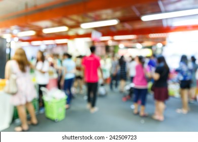 Abstract Blurred People Walking In Shopping Center