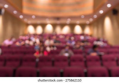 Abstract Blurred Photo Of Conference Hall Or Meeting Room With Attendee Background