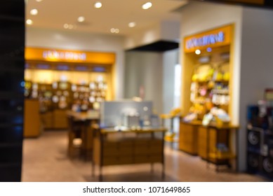 Abstract blurred photo of Cosmetic shop counter at department stores - Shutterstock ID 1071649865
