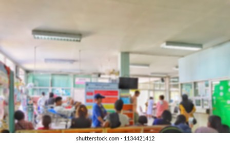 Abstract Blurred Photo Of Crowded People At Emergency Room In Hospital Where Is An Emergency Department ,is A Medical Treatment Facility Specializing In Emergency Medicine For Acute Care Of Patients.